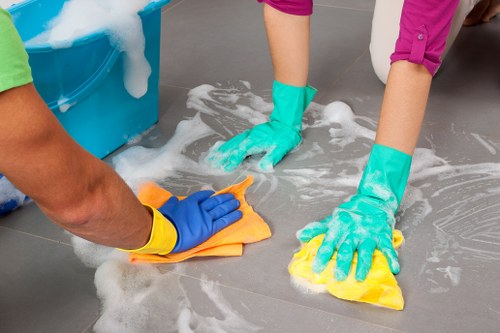 Office cleaning team working in a modern SW1 reception area