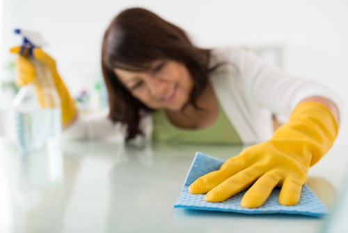 Preparing curtains for specialist cleaning in a SW1 apartment