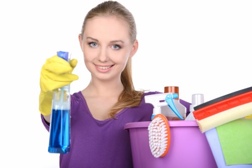 Cleaner checking a property area for slip and trip hazards